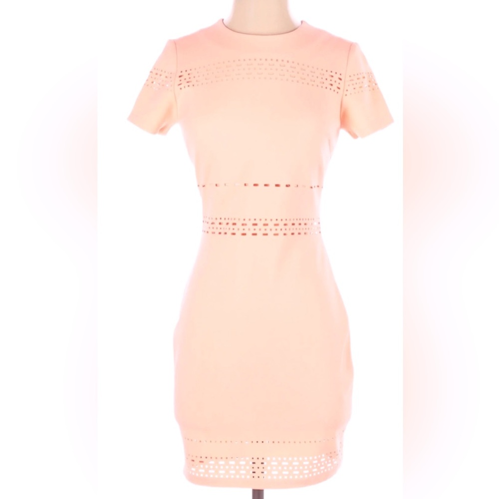 Women’s peach colored cocktail dress. Like new.